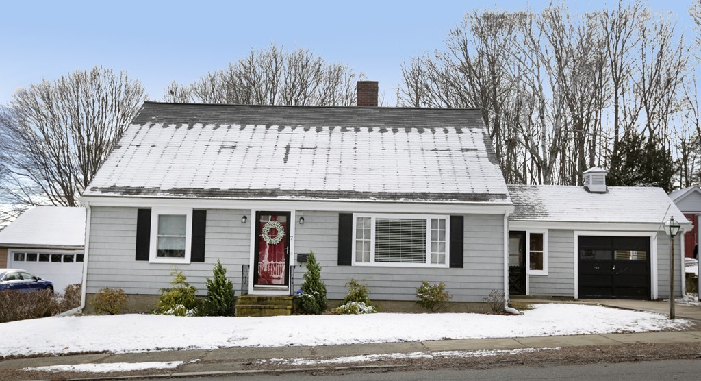 7 Pickman Road Salem, MA 01970 - Photo 1 of 25 a front view of a house with a yard and garage