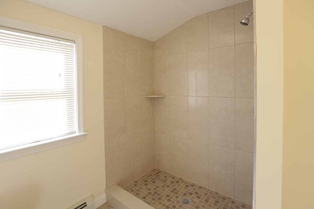 7 Pickman Road Salem, MA 01970 - Photo 11 of 25 a bathroom with a window