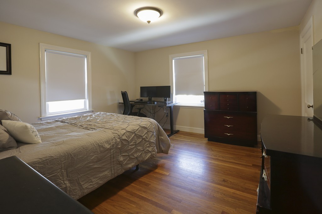 7 Pickman Road Salem, MA 01970 - Photo 14 of 25 a bedroom with a bed and a desk