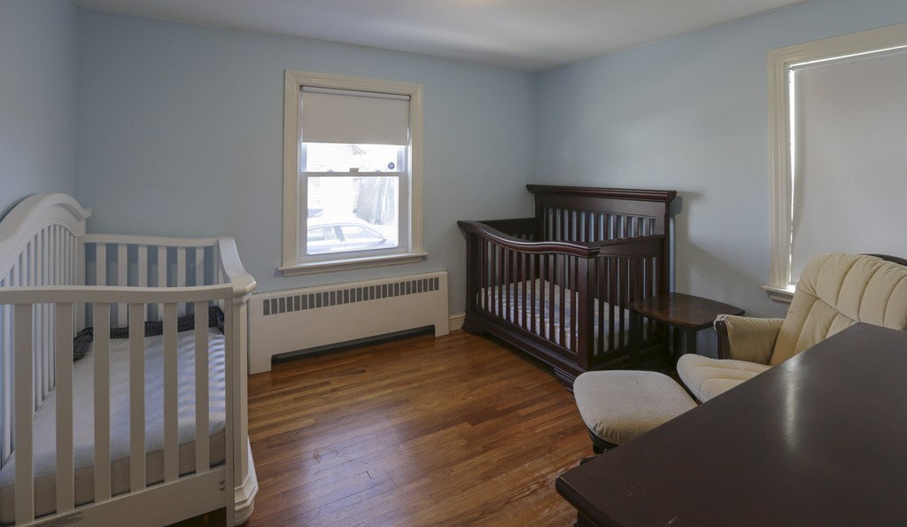 7 Pickman Road Salem, MA 01970 - Photo 16 of 25 a bedroom with furniture and a window