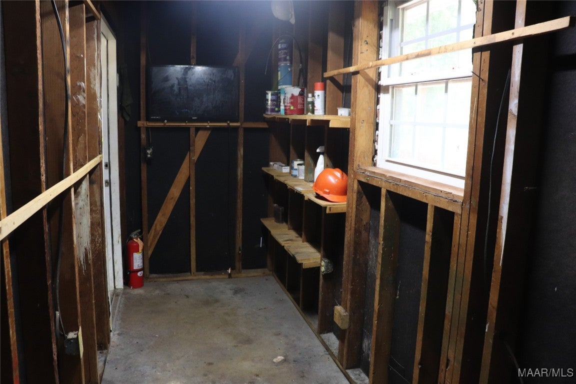 313 Holly Hill Road Enterprise, AL 36330 - Photo 41 of 44 Workshop or storage room off carport.