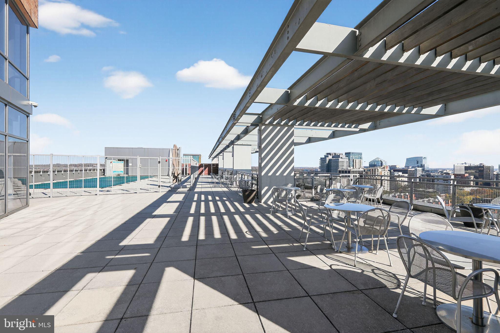 2001 15th Street North, Unit 420 Arlington, VA 22201 - Photo 1 of 27 a view of a balcony with furniture