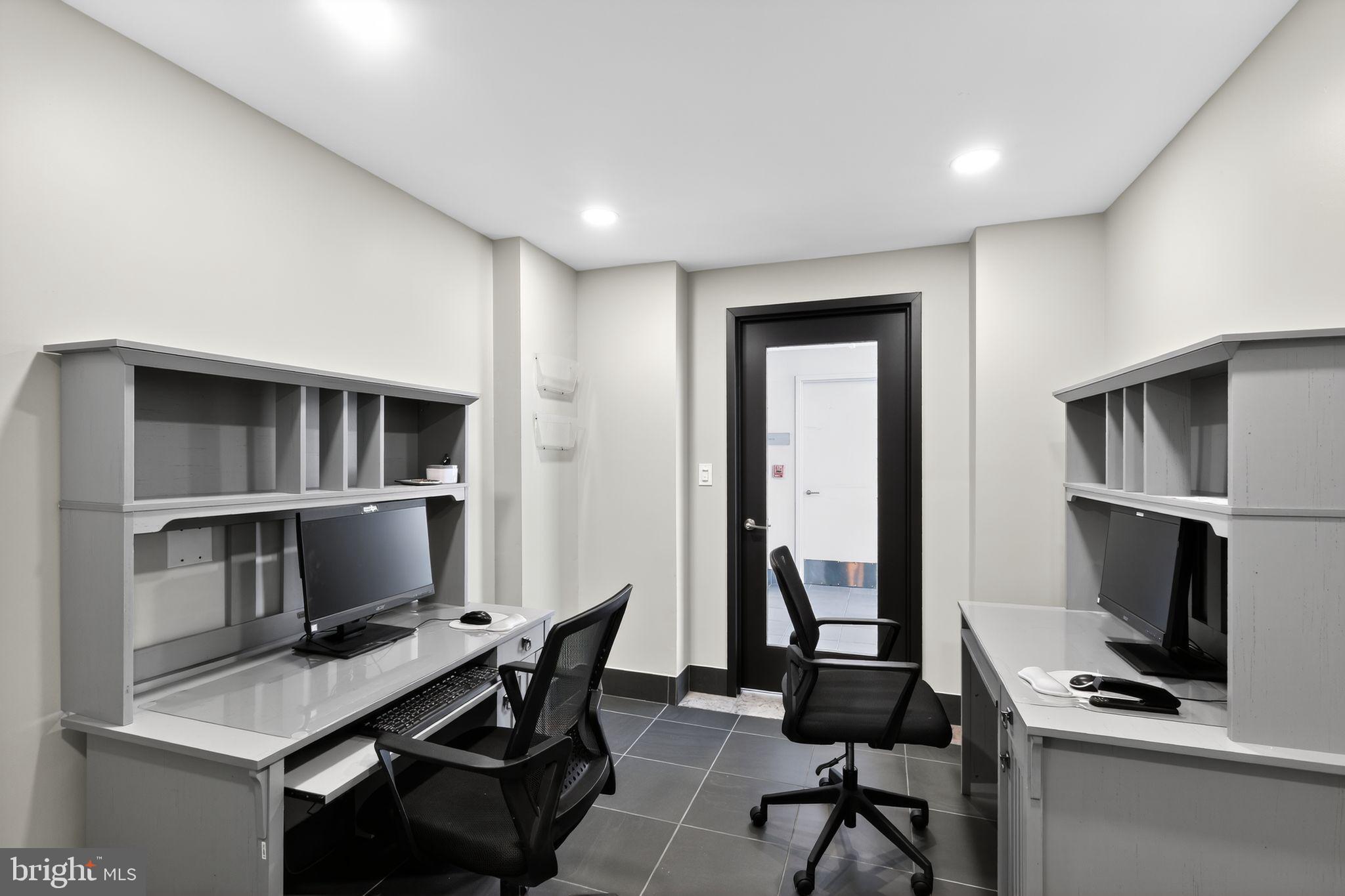 2001 15th Street North, Unit 420 Arlington, VA 22201 - Photo 24 of 27 a workspace with furniture and window