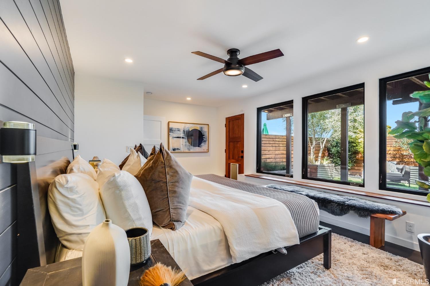 91 Bronte Street San Francisco, CA 94110 - Photo 17 of 24 a bedroom with a bed and window