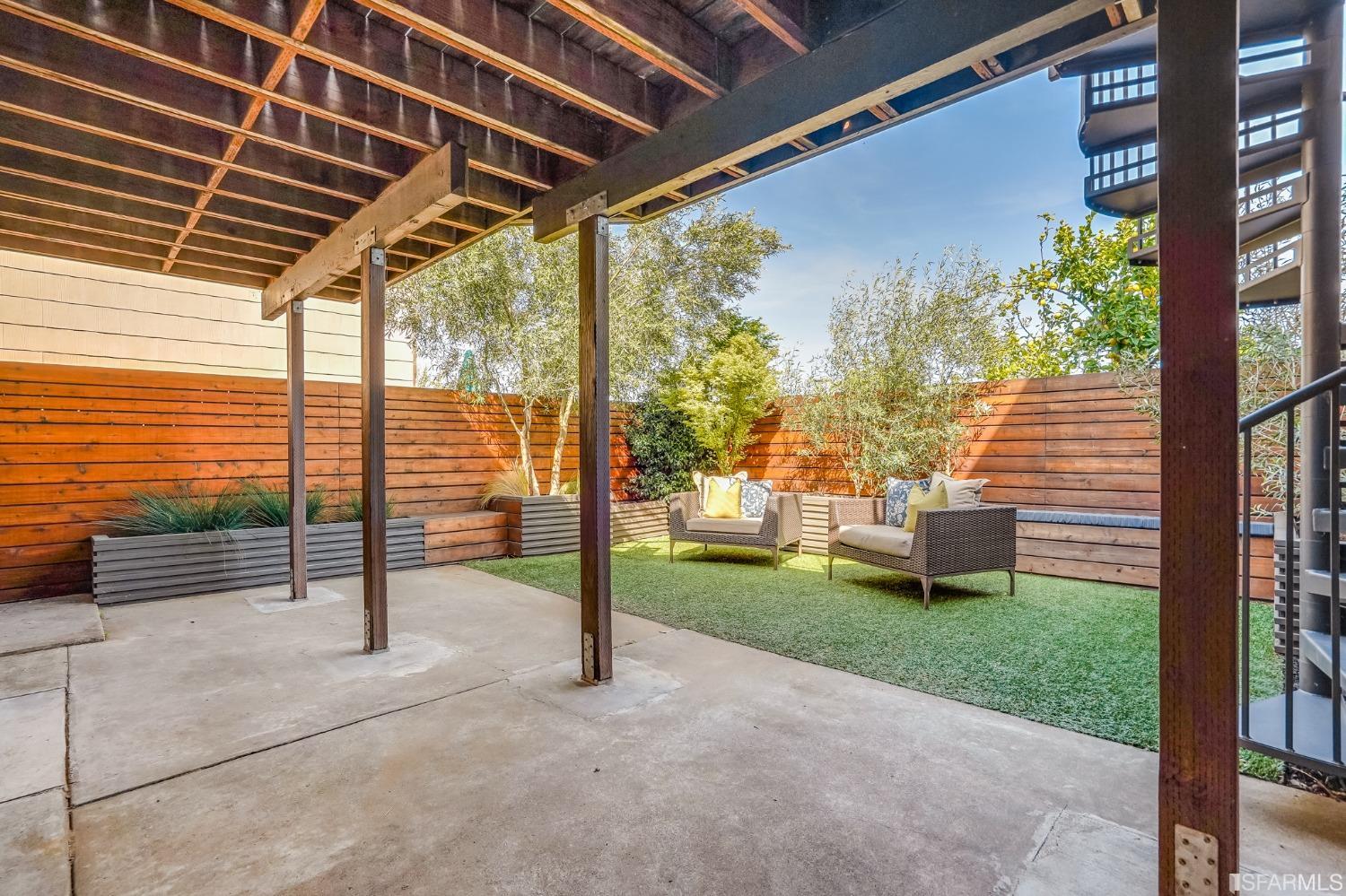 91 Bronte Street San Francisco, CA 94110 - Photo 18 of 24 a view of a porch with furniture and garden