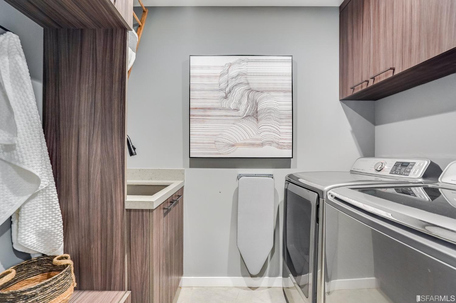 91 Bronte Street San Francisco, CA 94110 - Photo 20 of 24 a utility room with dryer and washer