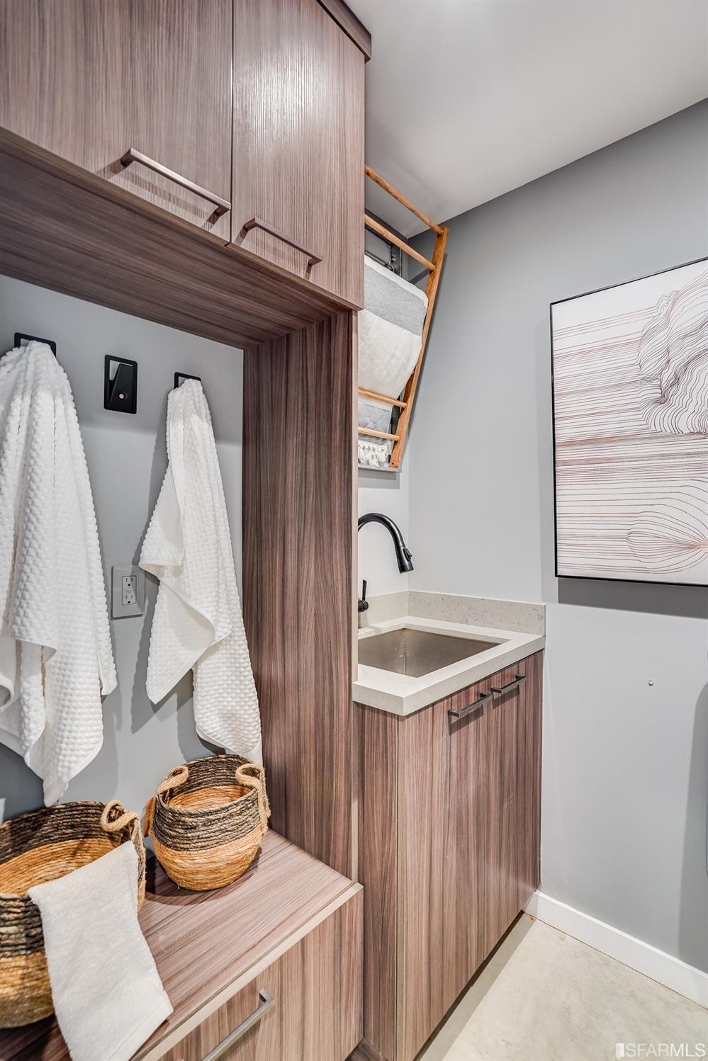 91 Bronte Street San Francisco, CA 94110 - Photo 21 of 24 a bathroom with a sink and a mirror