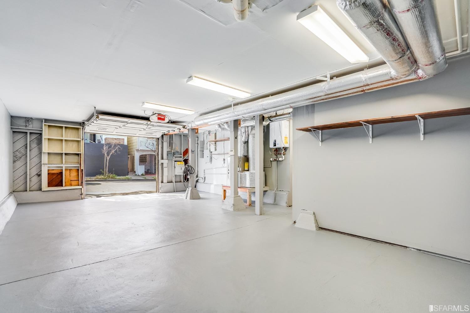 91 Bronte Street San Francisco, CA 94110 - Photo 23 of 24 a view of empty room with wooden floor and fan