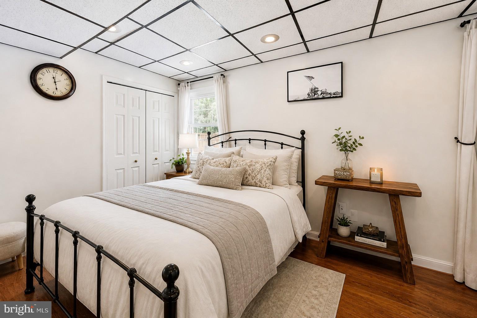 14216 Alderton Road Silver Spring, MD 20906 - Photo 27 of 63 a bedroom with a bed and a table