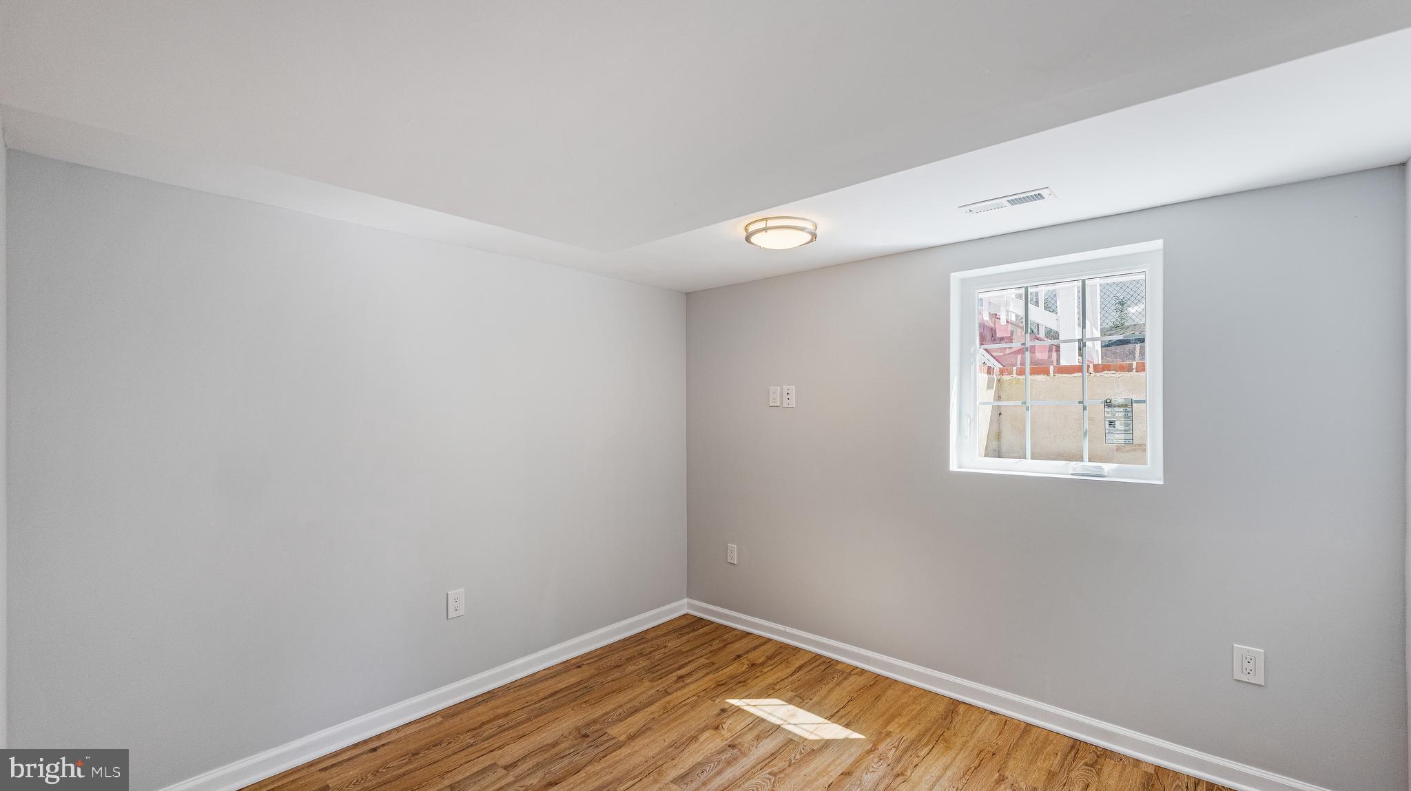 12205 Bond Street Silver Spring, MD 20902 - Photo 26 of 34 Lower level bedroom 4