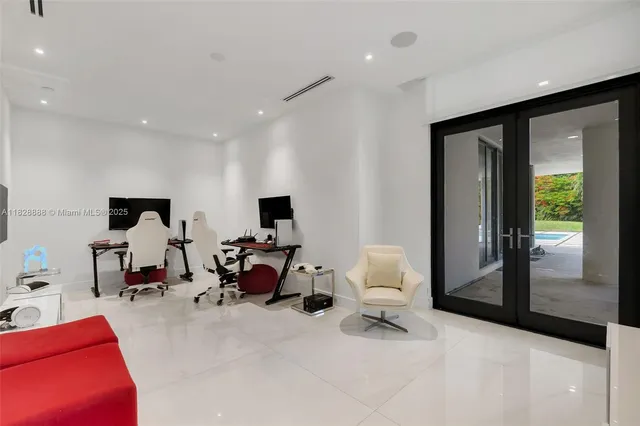 a bathroom with a shower sink and mirror