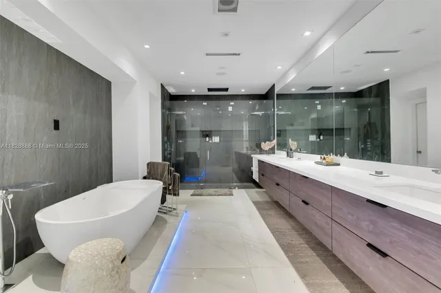 a view of a house with swimming pool and sitting area