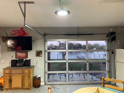 a view of a living room and a flat screen tv