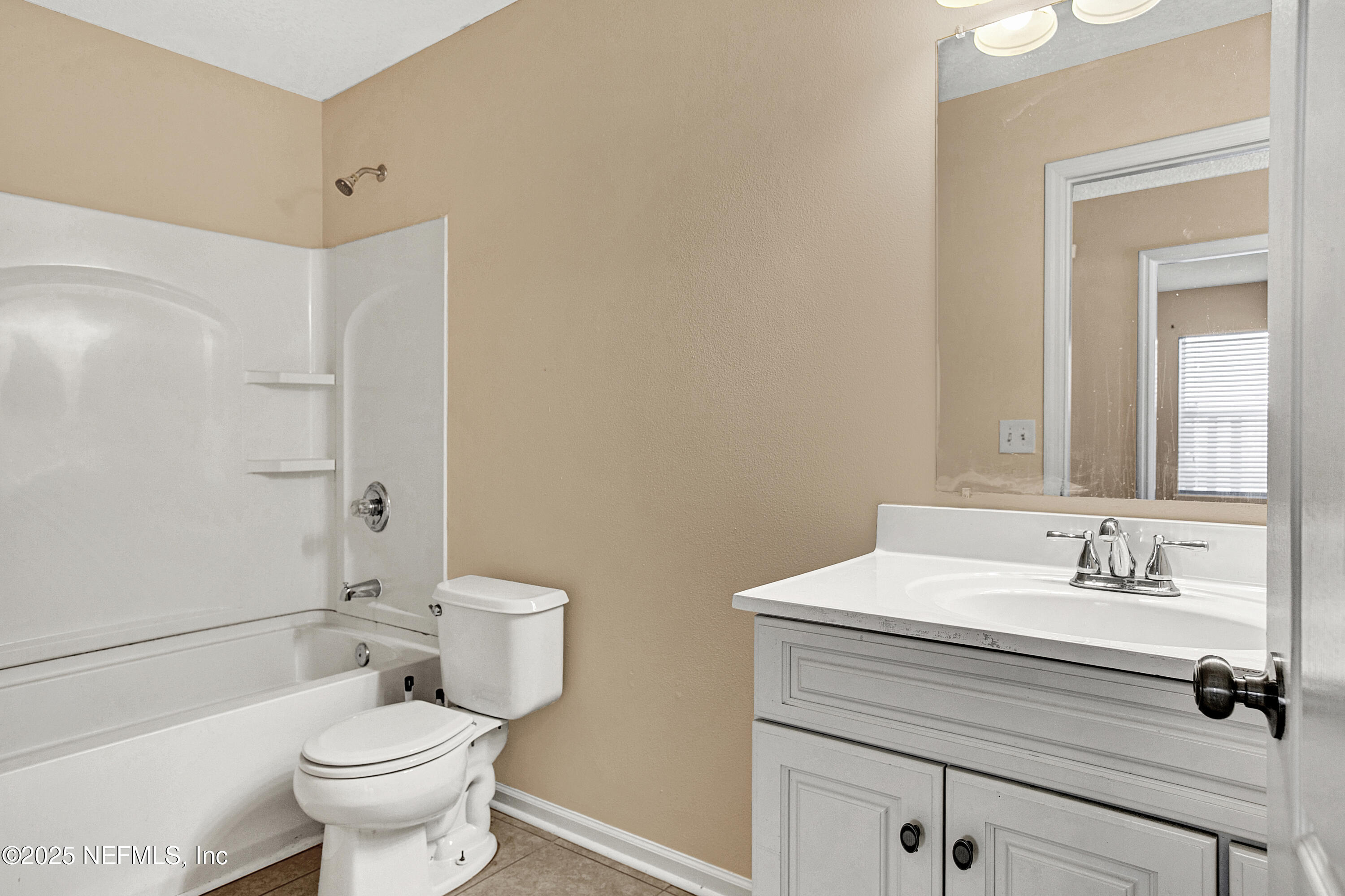 1164 Dawn Light Road Jacksonville, FL 32218 - Photo 13 of 19 a bathroom with a sink toilet and shower