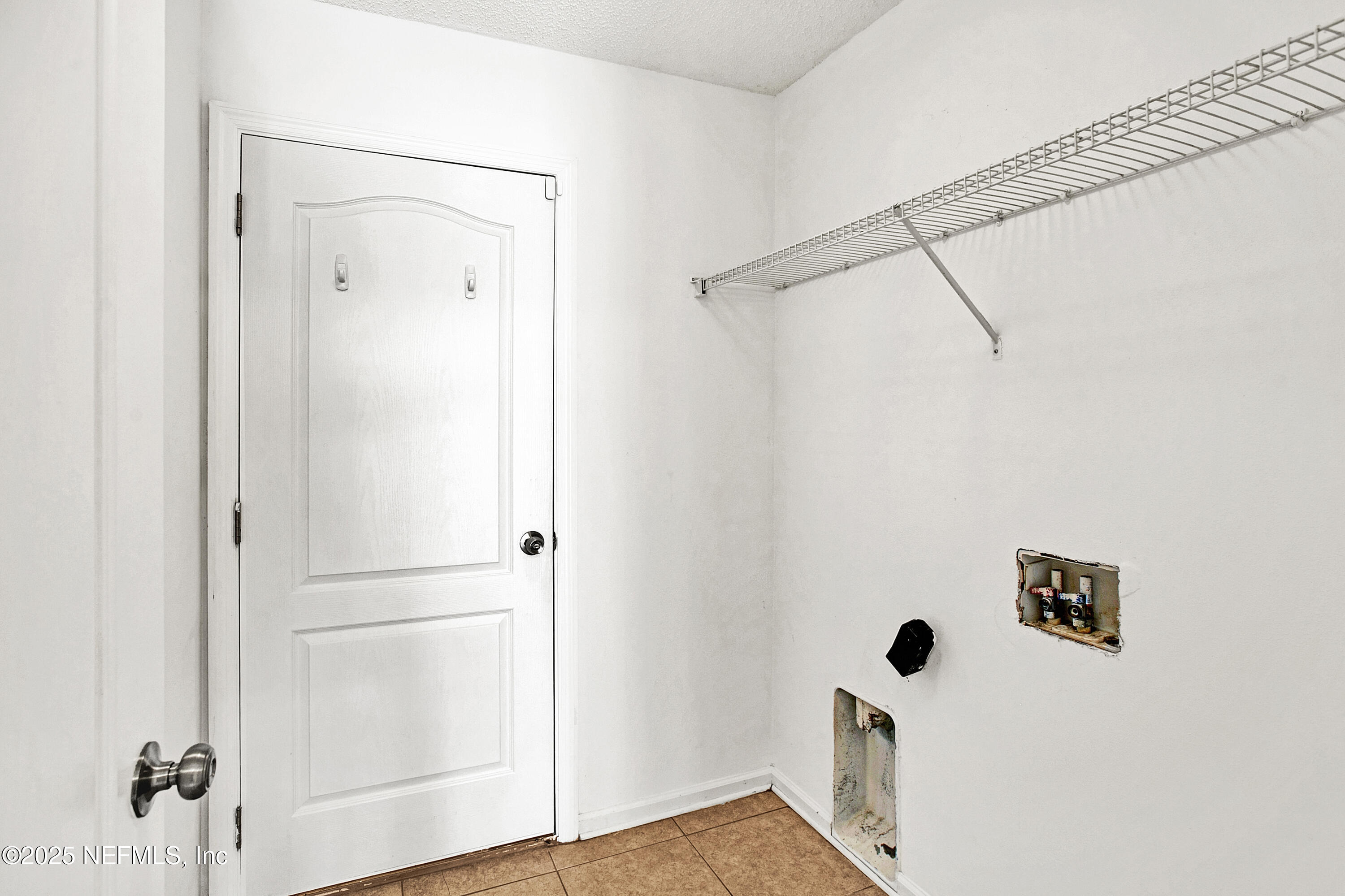 1164 Dawn Light Road Jacksonville, FL 32218 - Photo 17 of 19 a view of a bathroom with a shower