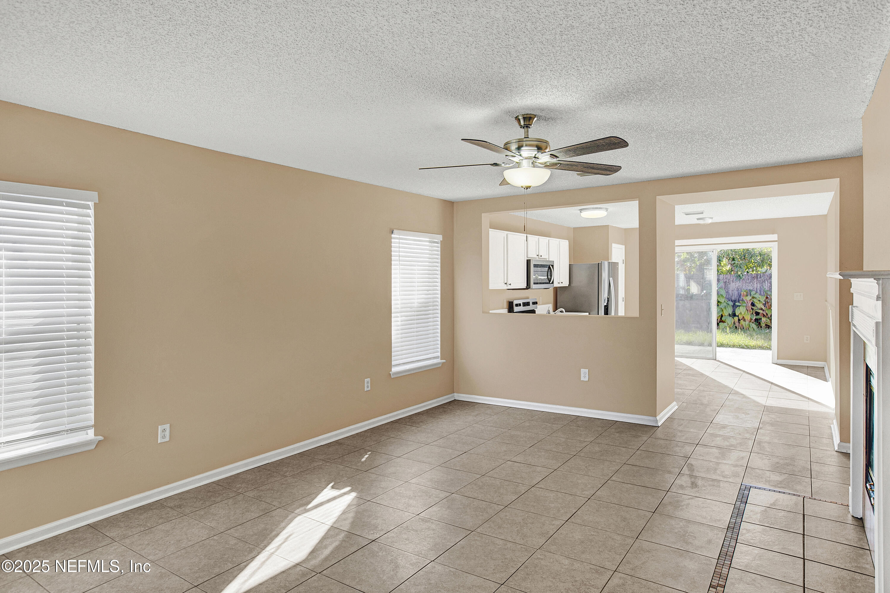 1164 Dawn Light Road Jacksonville, FL 32218 - Photo 4 of 19 a view of an empty room with a window