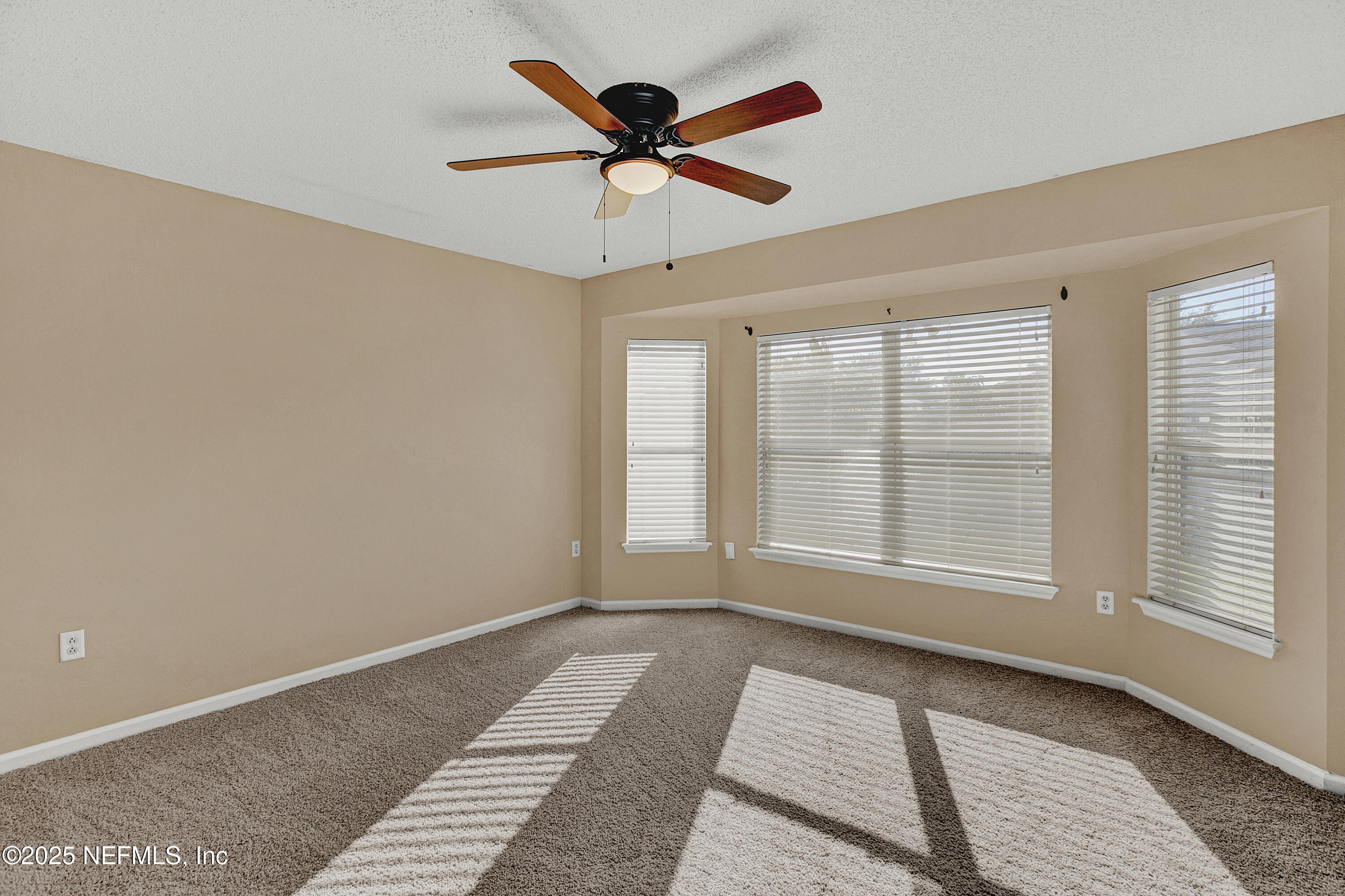 1164 Dawn Light Road Jacksonville, FL 32218 - Photo 8 of 19 a view of an empty room with a window