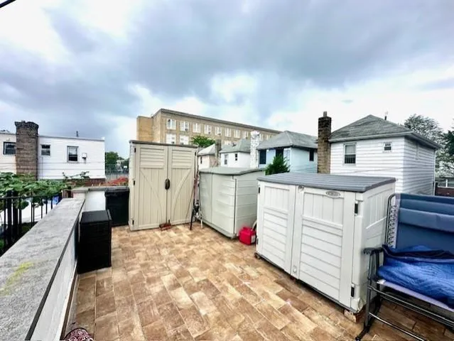 a view of entryway with furniture and wooden floor