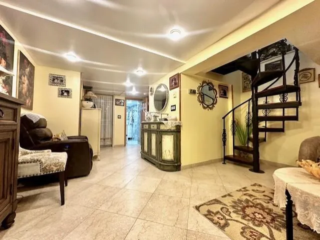 a bathroom with a toilet a sink and shower