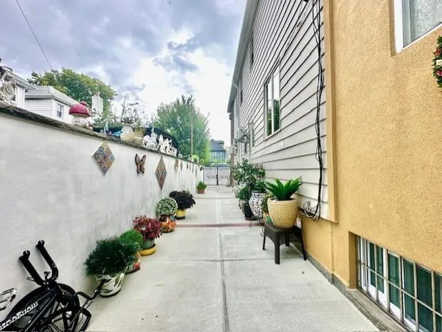 a view of a chairs and table in the balcony