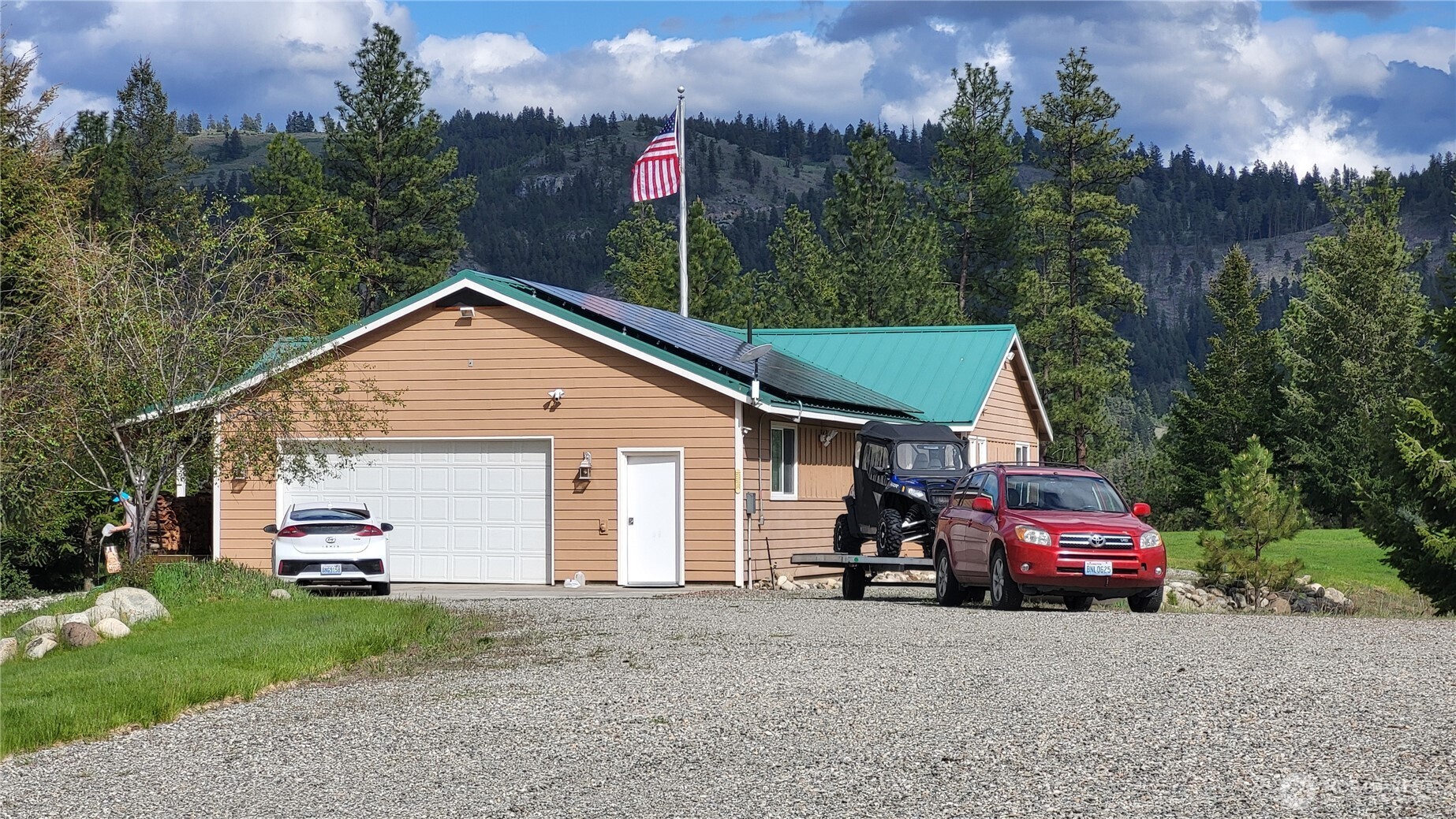 a car parked in front of a house