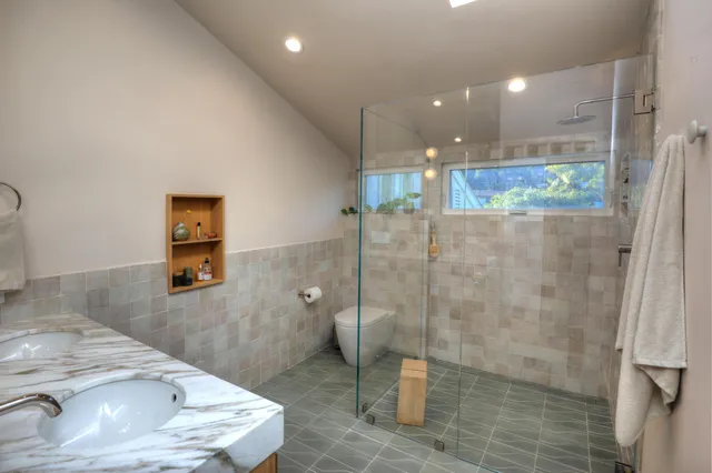 a bathroom with a sink and a shower