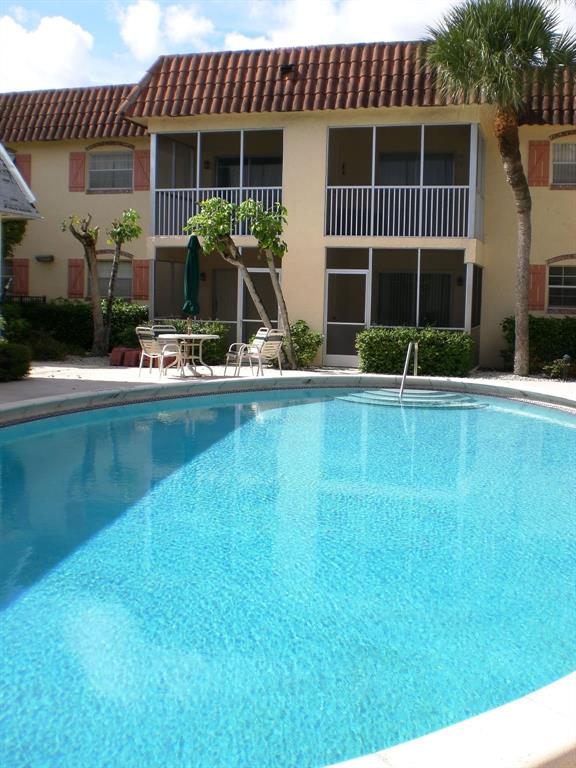 101 East McNab Road, Unit 428 Pompano Beach, FL 33060 - Photo 4 of 11 a front view of house with yard