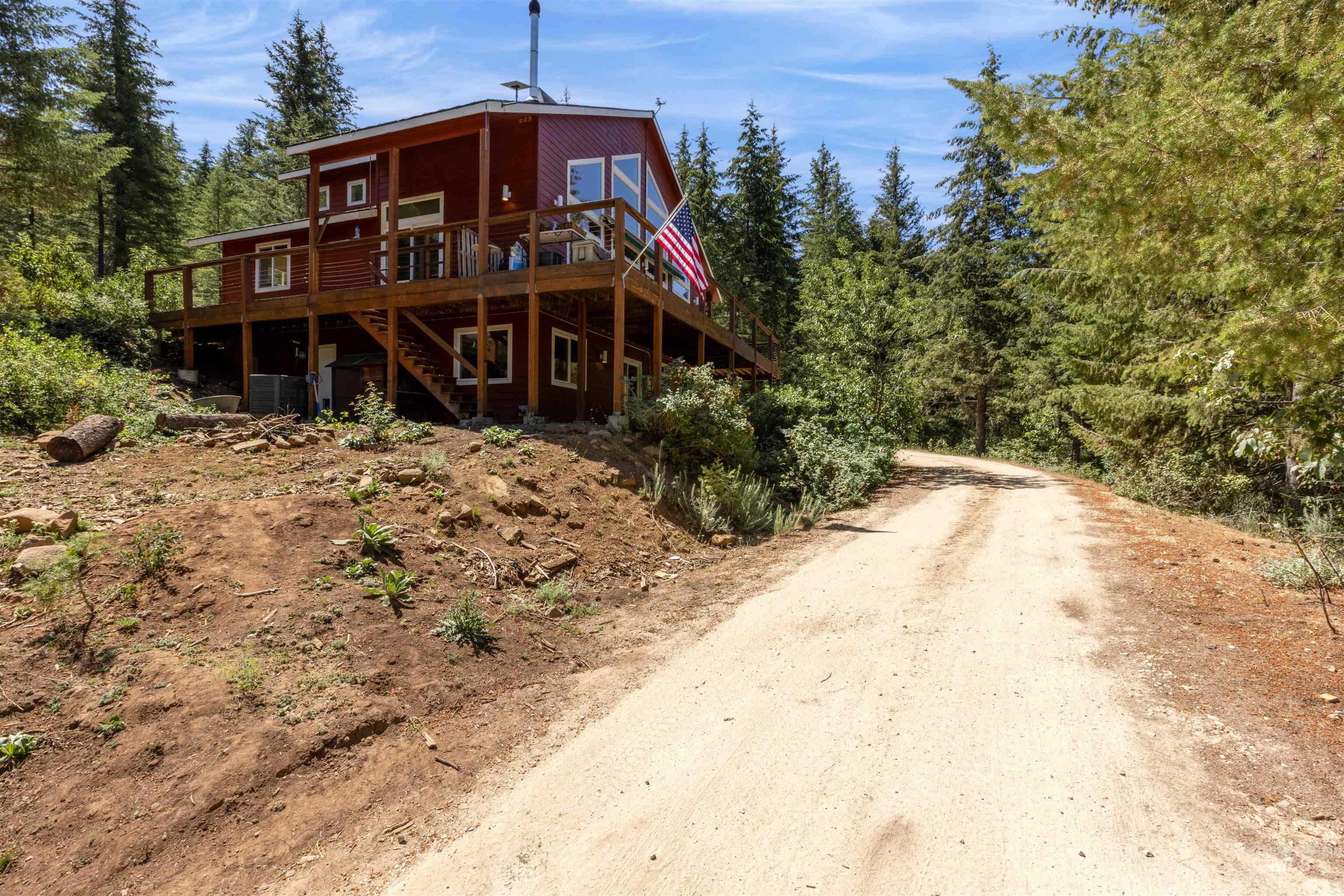 60 Highland Road Boise, ID 83716 - Photo 2 of 42 View of front of house featuring stairs and a wooden deck