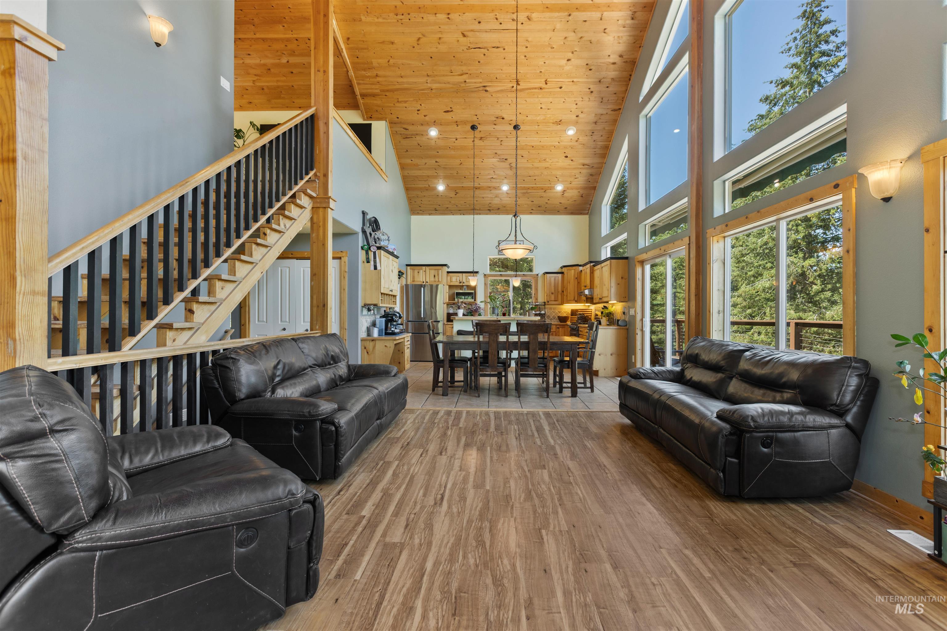 60 Highland Road Boise, ID 83716 - Photo 22 of 42 Living area with wooden ceiling, wood finished floors, high vaulted ceiling, and stairs
