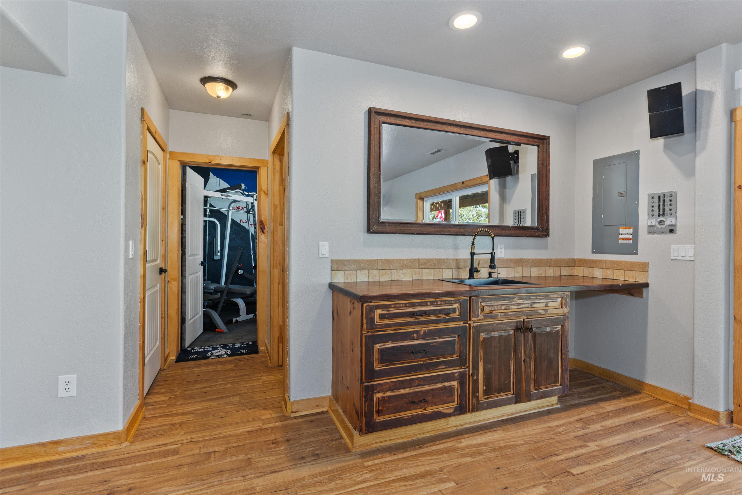 60 Highland Road Boise, ID 83716 - Photo 26 of 42 Bar featuring light wood-style floors and electric panel