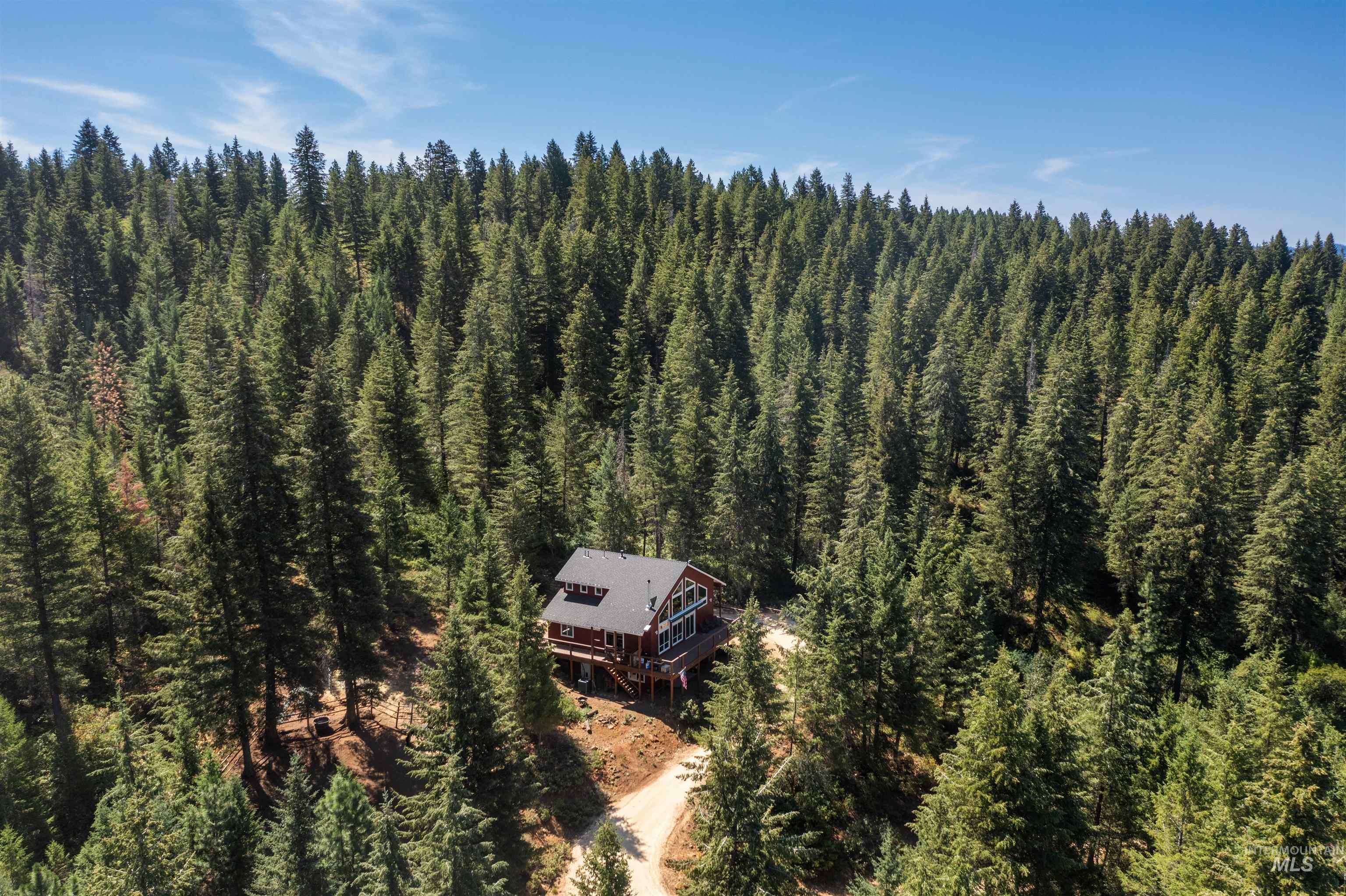 60 Highland Road Boise, ID 83716 - Photo 39 of 42 Aerial view of property's location with a forest