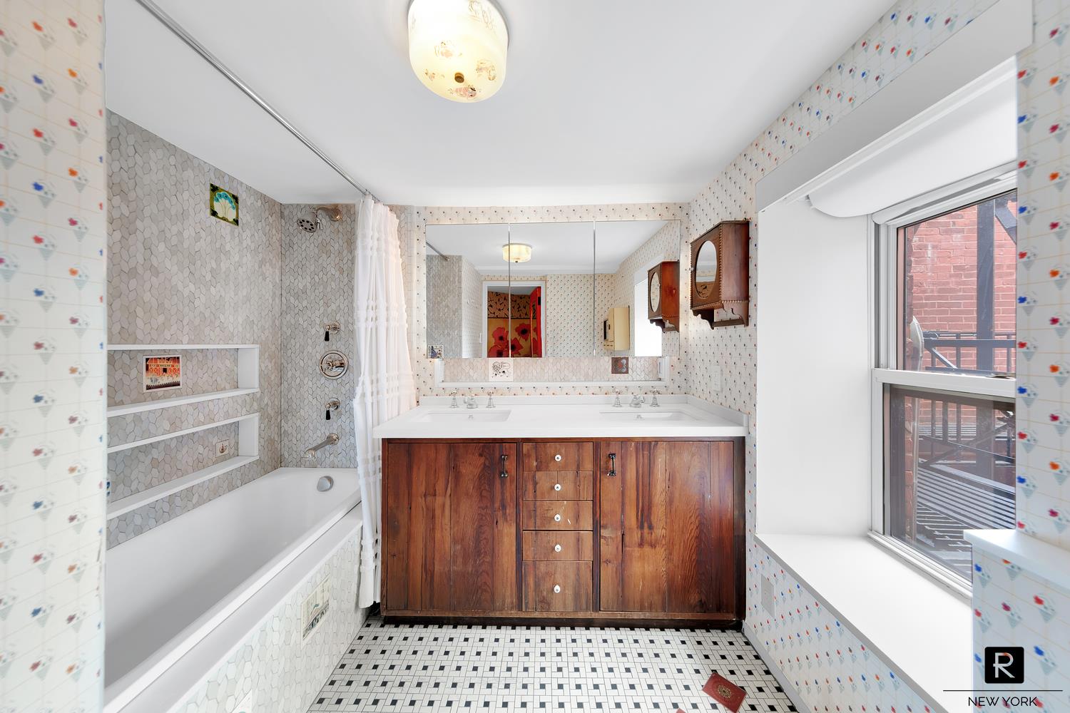 34 Gramercy Park East, Unit PHB Manhattan, NY 10003 - Photo 14 of 20 a bathroom with a sink a bathtub and a shower