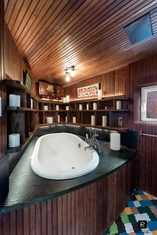 a kitchen with a sink and lots of counter top space