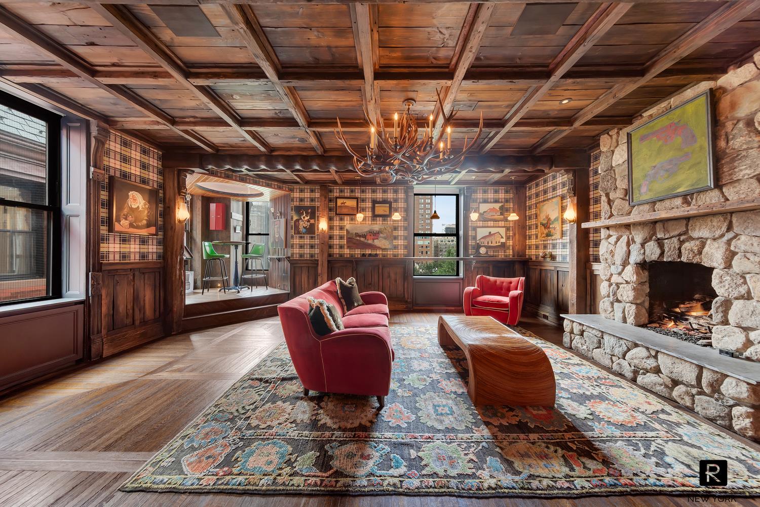 34 Gramercy Park East, Unit PHB Manhattan, NY 10003 - Photo 6 of 20 a living room with patio furniture and a fireplace