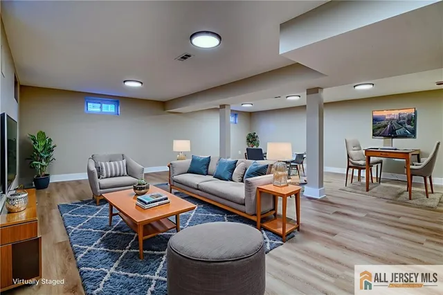 a bathroom with a bathtub and shower