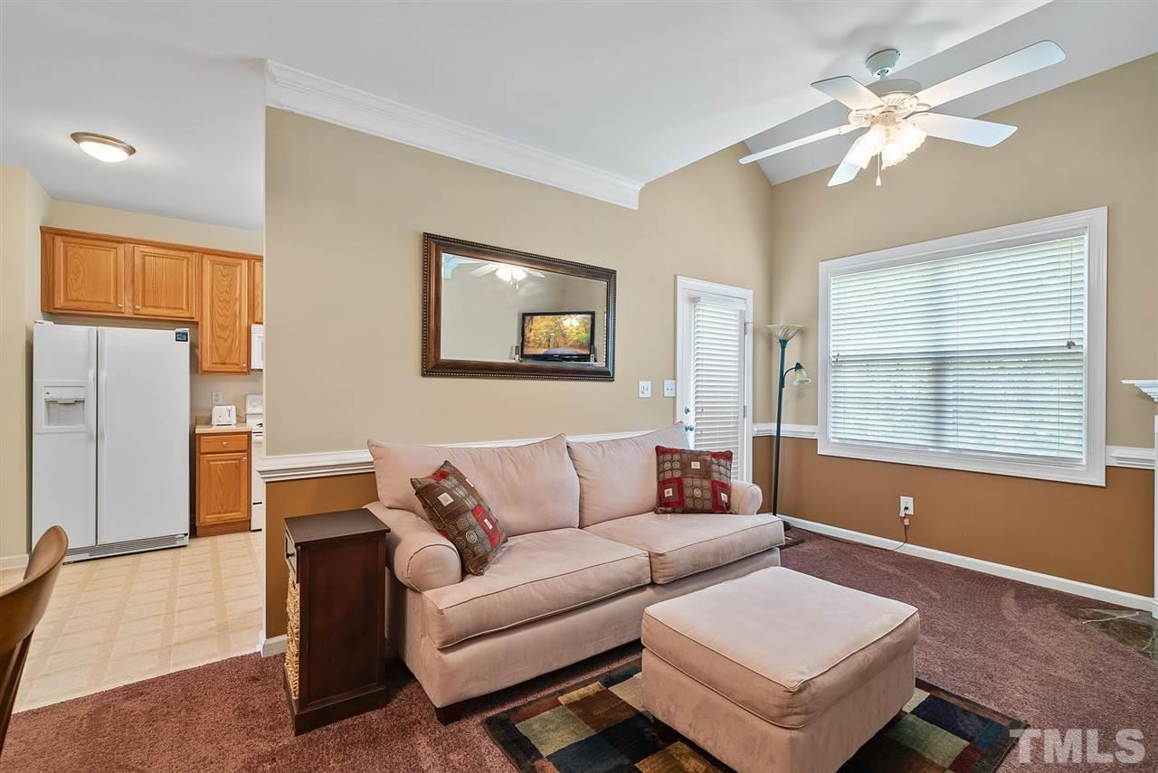 2632 Andover Glen Road Raleigh, NC 27604 - Photo 14 of 23 a living room with furniture and a window