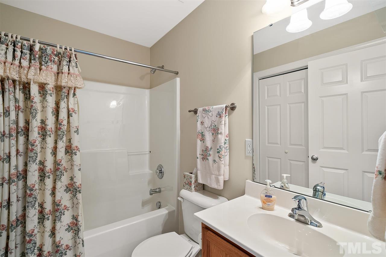 2632 Andover Glen Road Raleigh, NC 27604 - Photo 19 of 23 a bathroom with a sink toilet tub and shower
