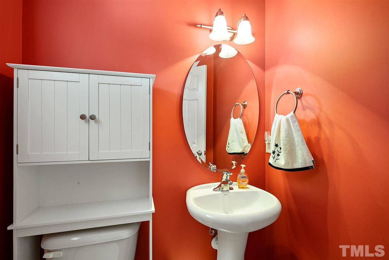 2632 Andover Glen Road Raleigh, NC 27604 - Photo 8 of 23 a bathroom with a sink and a mirror