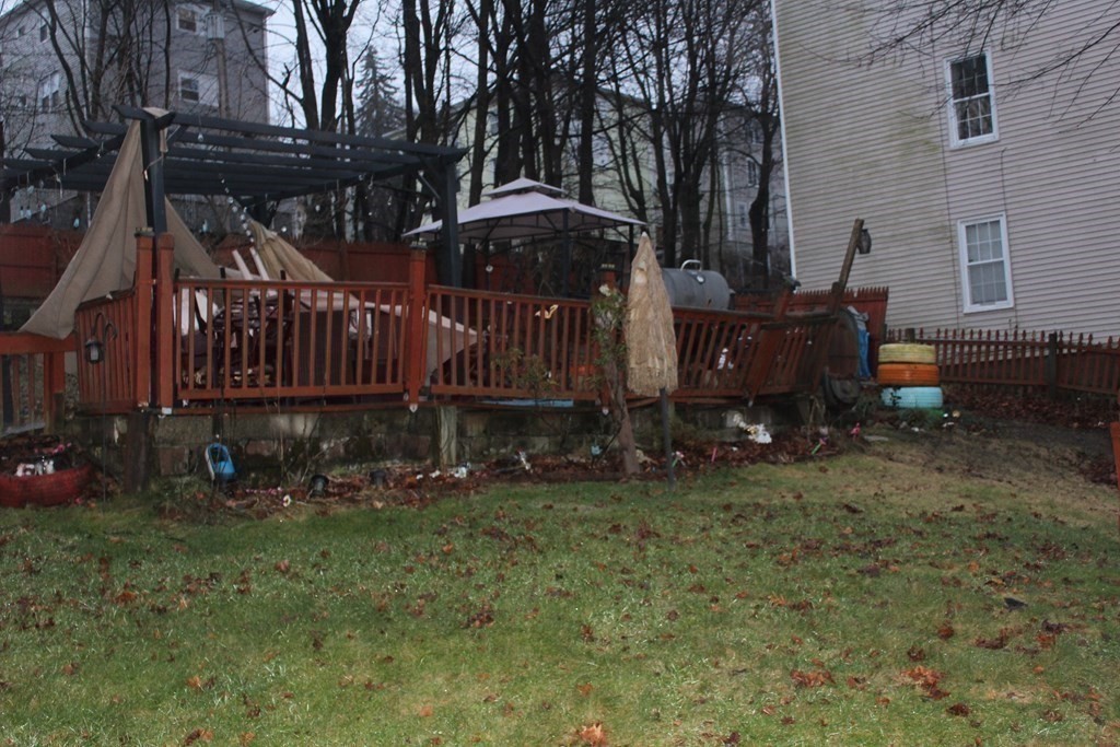 119 Rodney Street Worcester, MA 01605 - Photo 19 of 21 a view of a house with backyard and sitting area
