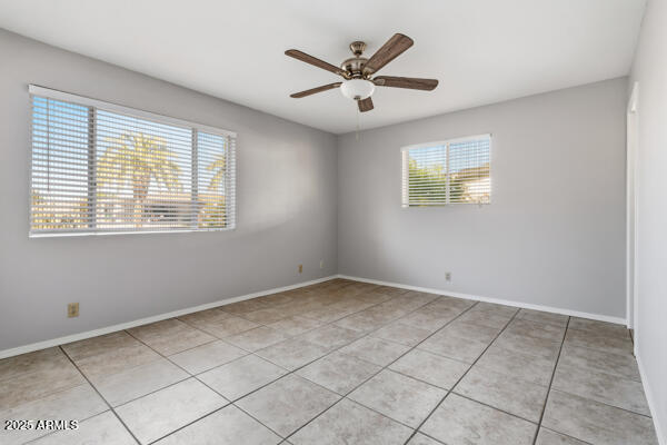 6117 East Decatur Street Mesa, AZ 85205 - Photo 12 of 29 a view of an empty room with a window