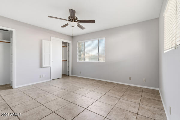 6117 East Decatur Street Mesa, AZ 85205 - Photo 13 of 29 a view of an empty room with a window