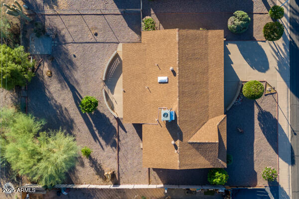 6117 East Decatur Street Mesa, AZ 85205 - Photo 25 of 29 an aerial view of residential houses with outdoor space