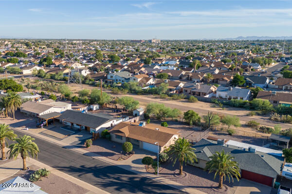 6117 East Decatur Street Mesa, AZ 85205 - Photo 27 of 29 an aerial view of a building with garden space and ocean view