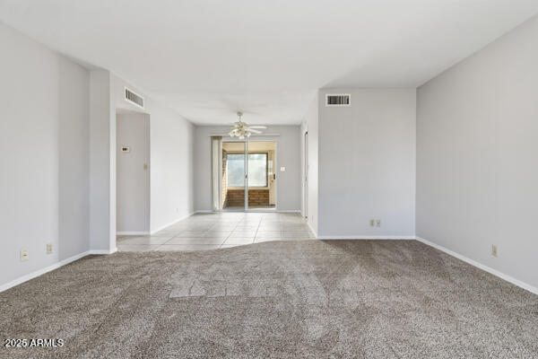 6117 East Decatur Street Mesa, AZ 85205 - Photo 5 of 29 a view of empty room with window