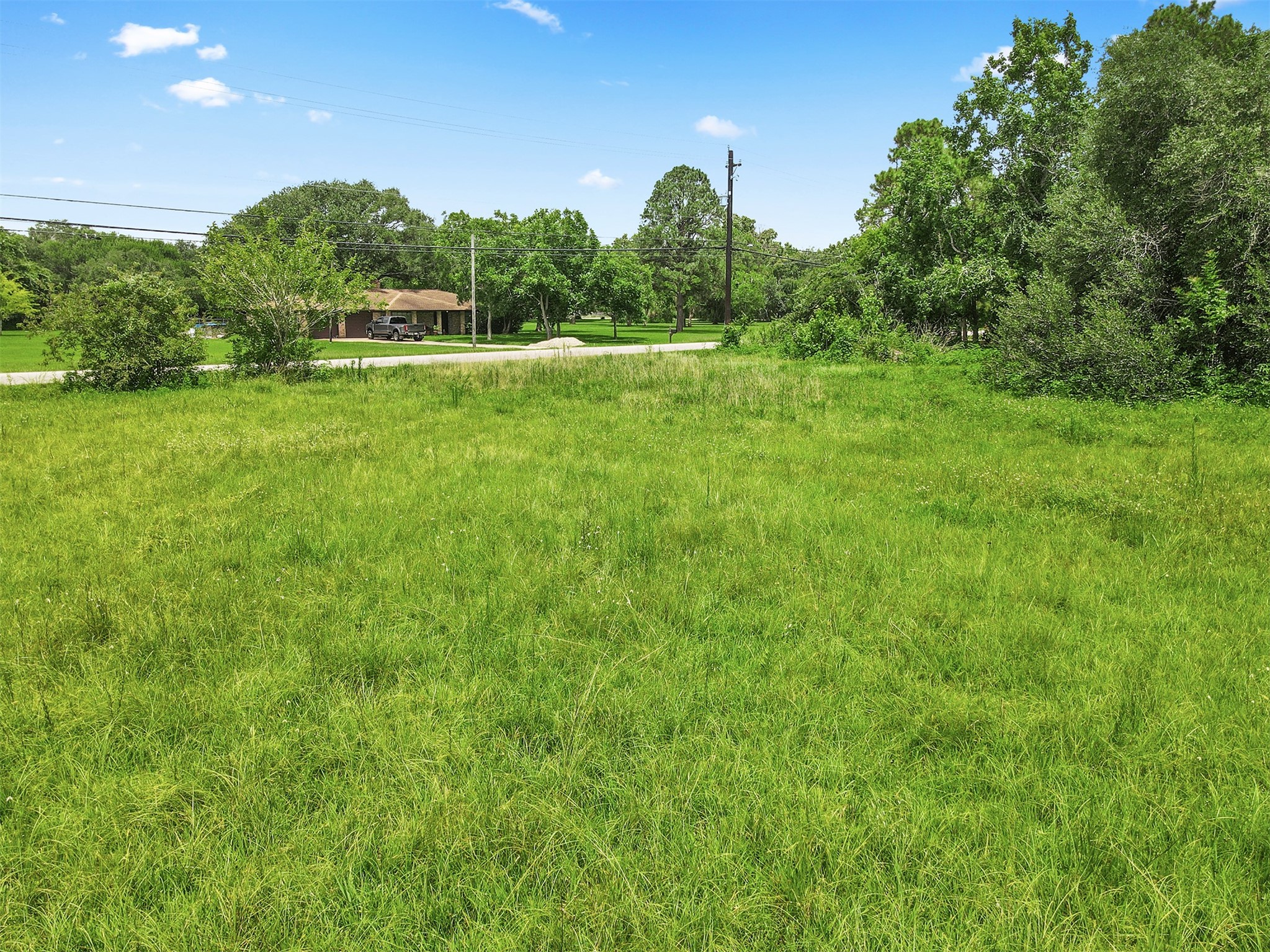 0 Avenue T Santa Fe, TX 77510 - Photo 6 of 9 a view of a green field
