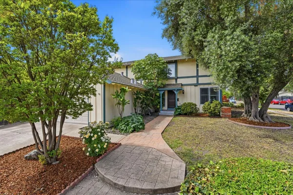 front view of a house with a yard