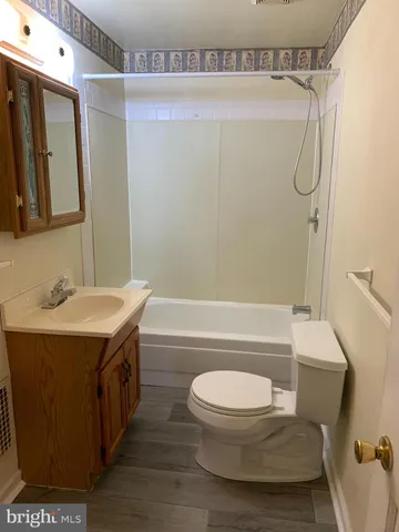 a view of a wooden fence