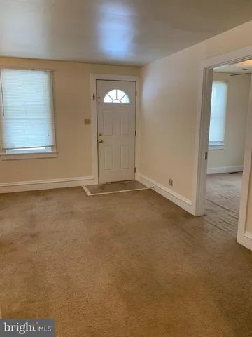 a view of a kitchen with a sink cabinets and window