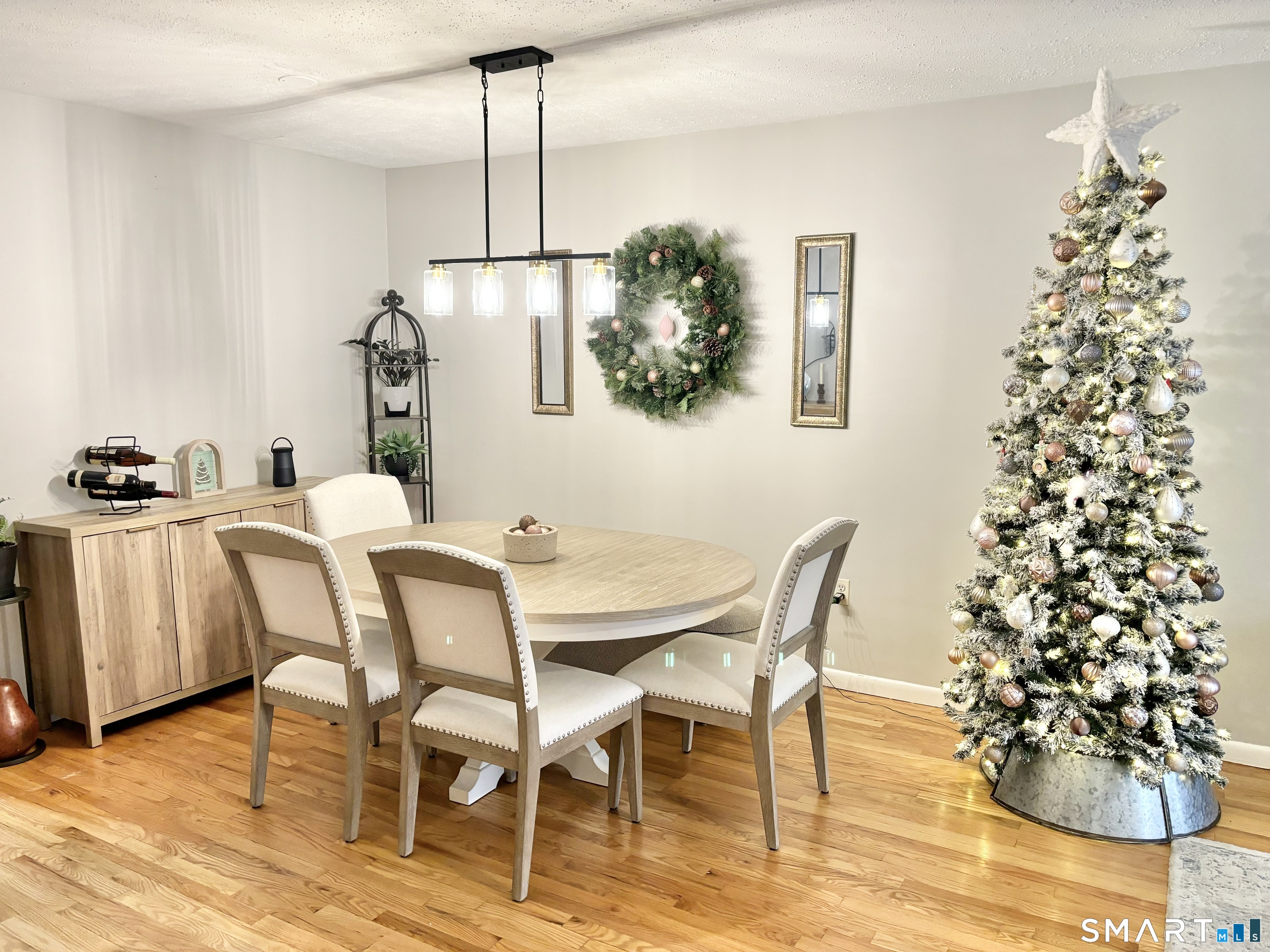 208 Flax Hill Road, Unit 12 Norwalk, CT 06854 - Photo 4 of 12 a dining room with furniture and window