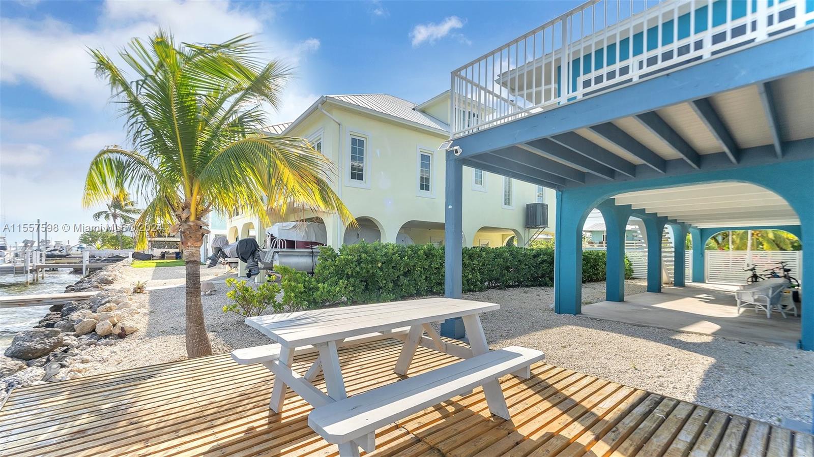441 La Fitte Road Summerland Key, FL 33042 - Photo 16 of 81 a view of a house with backyard and sitting area